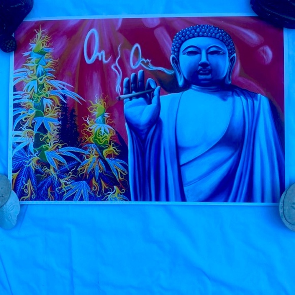 Om Om Buddha smoking a spliff with cannabis plant art poster. Signed by artist